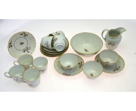 A late18th/early19th Century English fluted porcelain part tea service, possibly Worcester, decorated with a stem of puce flo