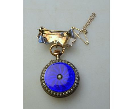 A Swiss 800 grade and gilt lady's fob watch with enamel dial and top-wind movement, the blue enamelled case inset with seed p