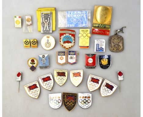 An interesting collection of Olympic and other enamel badges and lapel pins, formerly the property of television sports journ