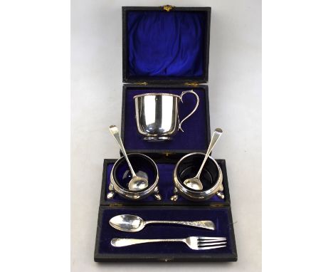 A pair of 18th century silver circular open salts with blue glass liners, on hoof feet (marks obscured), to/w two Georgian sa