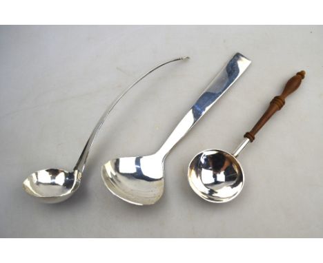 A modern design silver sauce ladle, maker JA, London 1998, to/w another ladle with turned wood handle, also by JA, London 199