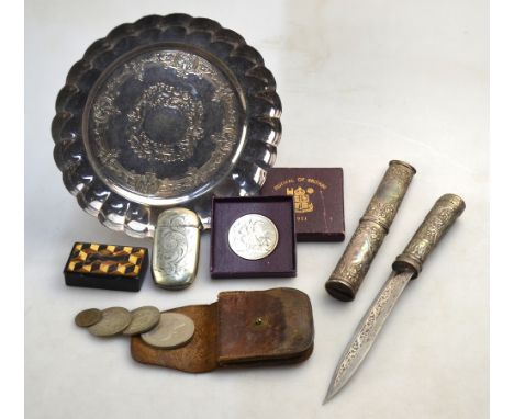 An Indian dagger with 14cm engraved blade and embossed low grade white metal handle and sheath, 23 cm overall to/w a ep vesta