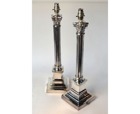 A pair of electroplated classical column table lamp bases, 56 cm
