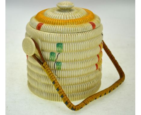 Clarice Cliff Bizarre 'Raffa' biscuit barrel and cover painted with an abstract design, approximately 16 cm high, c. 1930's C