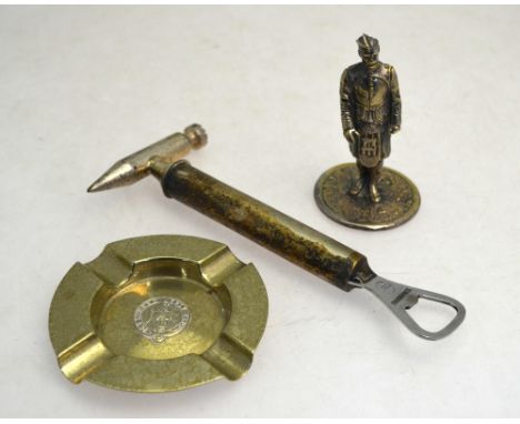 A cast metal car mascot - Black Watch officer, 10 cm, to/w an electroplated ice-hammer with integral corkscrew and bottle ope
