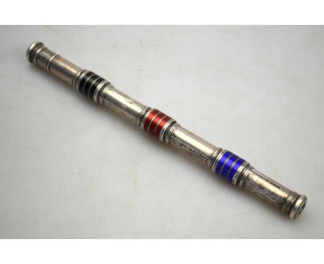 A late Victorian silver and enamel three-colour propelling pencil, the screw-down seal end closing triple refill lead compart