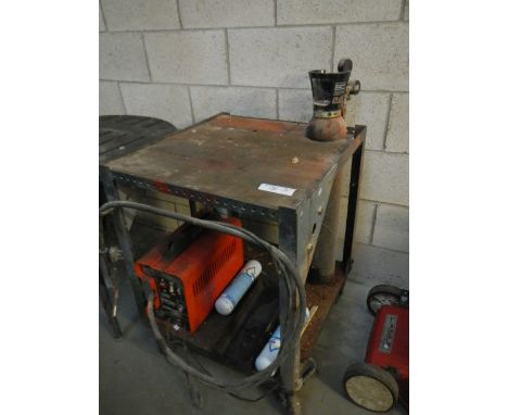 A metal bench incorporating welder