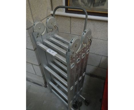 An aluminium ladder and trolley