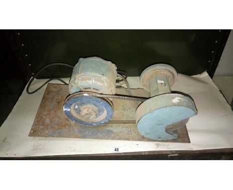 An electric bench grinder