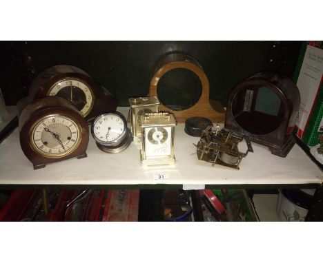 A quantity of clocks including mantle clocks & mantle clock cases