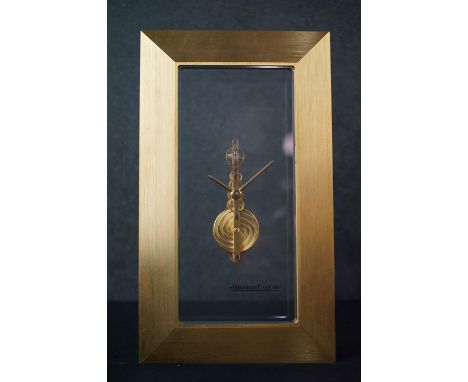 Jaeger-LeCoultre Skeleton Clock with floating Baguette movement housed in a rectangular glass and polished brass case, number