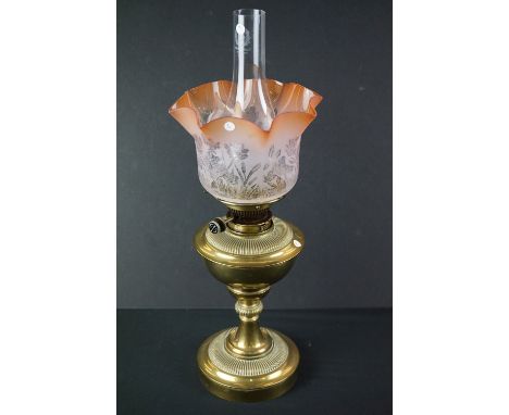 Late 19th / Early 20th century Brass Oil Lamp with Hinks Burner marked ' Harrods ' on wick winder, orange tinted etched flute