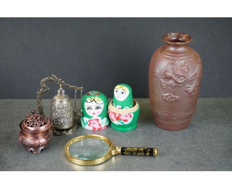A small group of oriental collectables to include a ceramic vase and a magnifying glass 