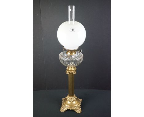 Late 19th / Early 20th century Brass Corinthian Column Oil Lamp with clear cut glass font, Hinks burner and globular opaque g