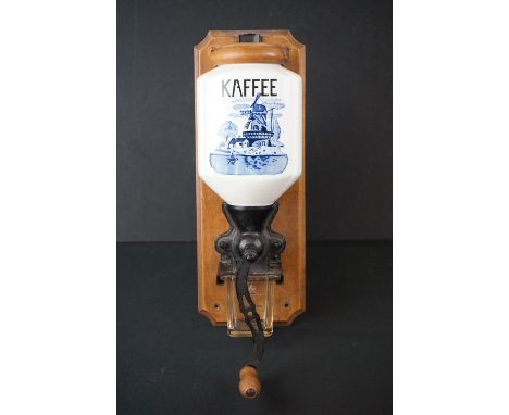 Mid 20th century German Wall Hanging Coffee Grinder, the ceramic bean holder marked ' Kaffee ', 31cm high 