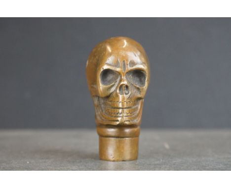 Metal walking stick handle in the form of a skull 