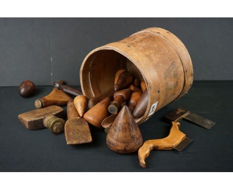 A wooden Pasta storage jar together with a quantity of wooden tools. 
