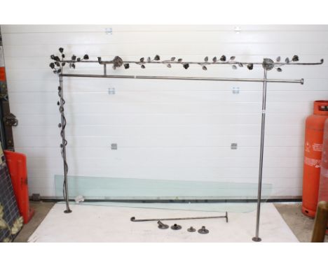 Forged Metal Wall Fixed Clothes Rail and Glass Shelf with silvered finish, the side and top rail entwined with metal roses an