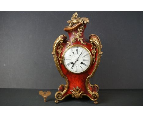 French Boulle style Mantle Clock, 8 day movement, the shaped faux tortoiseshell case with ormolu scrolling mounts, white enam