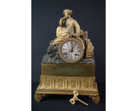 19th century Continental Gilt Brass Figural Mantle Clock, 8 day movement, the case surmounted by a Turkish Soldier seated on 