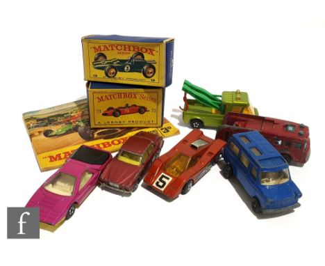 Two Lesney Matchbox 1-75 series diecast models, a 19d Lotus Racing Car in green with RN 3 and a 73b Ferrari F1 Racing Car in 