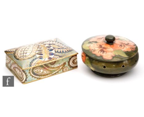 A Moorcroft pot pourri and cover decorated in the coral Hibiscus pattern, the base with three holes to the side wall, impress