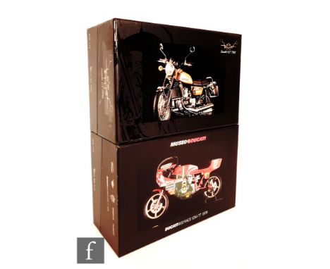 Two Minichamps Classic Bike Series 1:12 scale diecast model motorcycles, No. 5 Suzuki GT 750J and No. 8 Ducati 900 Racer IOM 