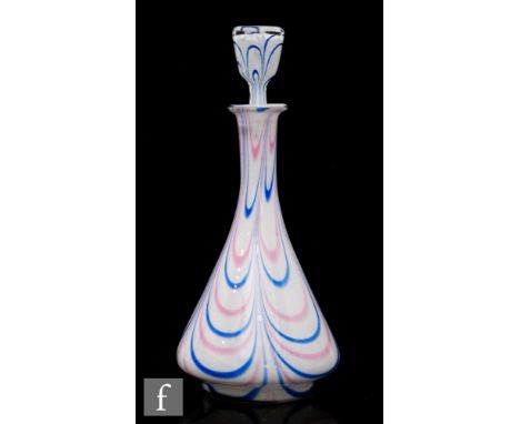 A 19th Century Nailsea style decanter of tapered conical form with tall collar neck, decorated with a pink and blue pulled lo