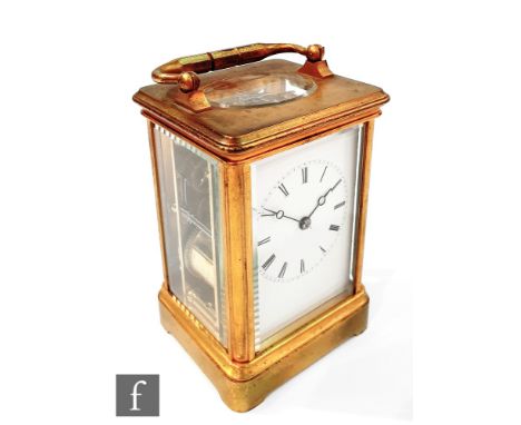 An early 20th Century carriage clock with Roman numerals to the white enamelled dial, the unsigned movement numbered 7459, he