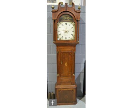 An early 19th Century oak and mahogany crossbanded longcase clock, the painted arch dial detailed with a ploughman and field 