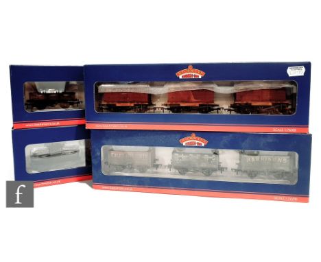 Ten OO gauge Bachmann rolling stock multipacks, to include plank wagons, tank wagons, ex-private owner's wagons, etc. Some du