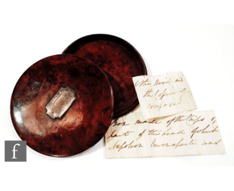An early 19th Century burr yewwood circular snuff box mounted with a plated plaque inscribed presented by John Ellis Esq to J