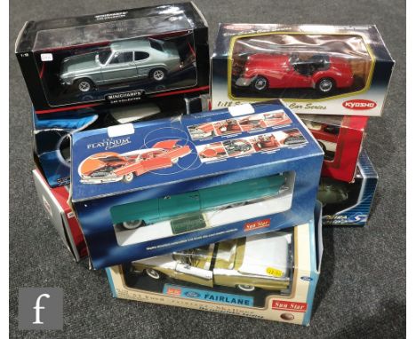 Eight 1:18 scale diecast models, comprising a Kyosho Triumph TR3A, a Minichamps Ford Capri, a Sun Star Lincoln Premiere, a Su