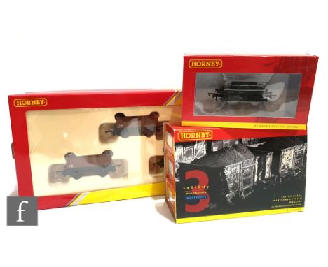 A collection of OO gauge Hornby rolling stock, to contain four Railroad Edition triple packs, a set of three weathered wagons