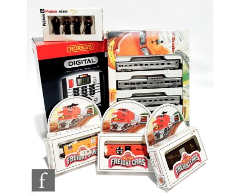 A collection of assorted model railway items in various gauges, comprising a HO gauge Bachmann Texas Chugger locomotive, nine