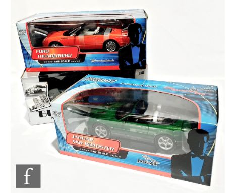 Three 1:18 scale film related diecast model cars, comprising ERTL American Muscle Bullitt 1968 Ford Mustang, Paul's Model Art
