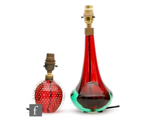 Two later 20th Century Murano glass lamp bases, the first of squat form with long tapered neck, the sommerso glass with a red