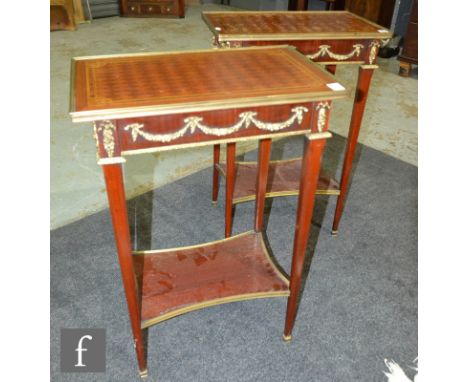 A pair of late 20th Century reproduction walnut marquetry veneered bedside or lamp tables, with decorative gilt metal mounts,
