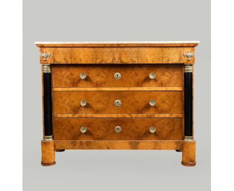 A FRENCH MARBLE TOPPED COMMODE. 20th century, with a frieze drawer to top and three drawers below, turned columns to sides wi