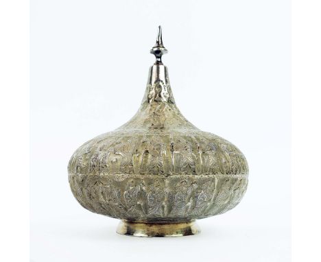A PERSIAN WHITE METAL BOWL AND COVER. probably 19th century, elaborately embossed with warrior figures, with shell decoration