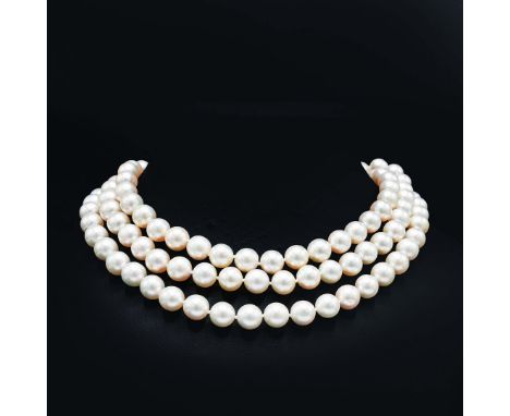 A THREE STRAND CULTURED PEARL CHOKER NECKLACE. each strand of graduated length, fitted with 115 10mm round pearls, secured on