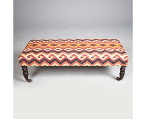 PART VICTORIAN STOOL. kilim tapestry style upholstery and ceramic castors, 33cm H x 106cm W x 47cm D.