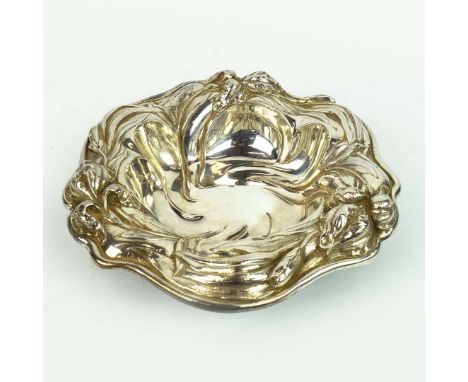AN ART NOUVEAU STERLING SILVER SERVING BOWL. scalloped shaped embossed in high relief with tulips, stamped to underside 1758,