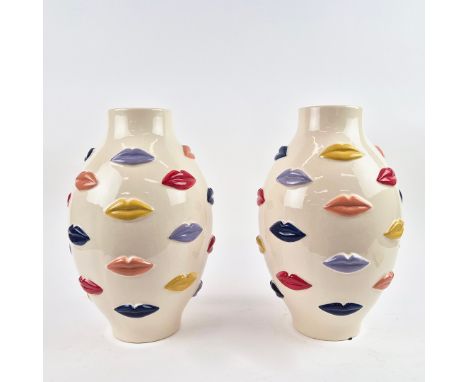 A PAIR OF CONTEMPORARY LIPS VASES. Glazed ceramic 38cm H x 22cm W.