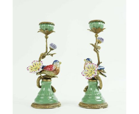 CANDELSTICKS, A PAIR. in the form of birds amongst flowers, gilt metal and ceramic, 29.5cm H approx. (2).