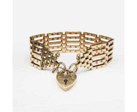 A 9CT GOLD GATE-LINK BRACELET. fitted with a clasp in the form of a lock, 18cm / 7 inches long, 23 grams.