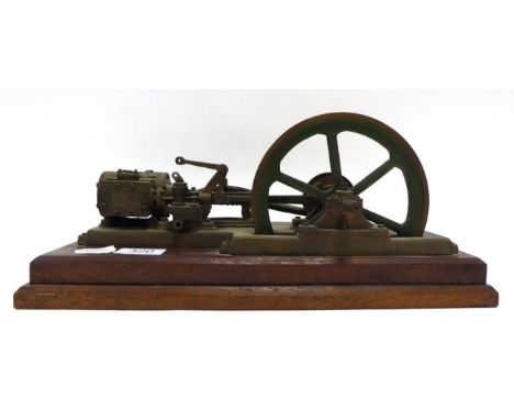Kit Built Live Steam Stationary Engine with single horizontal cylinder with wood lagging and single flywheel, mounted on maho
