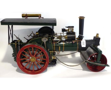 Maxwell Hemmens Live Steam 1'' Scale Road Roller finished in green with brass boiler bands, painted and lined wheels and wood