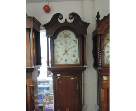 A late 18th century oak longcase clock having swan neck and pillar hood containing painted arch face and 30 hour movement by 