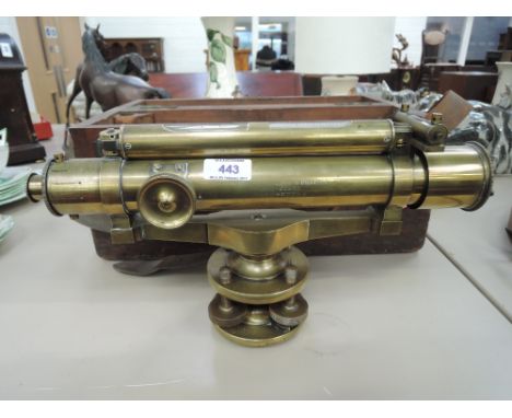A 19th century brass surveyors level engraved for Thomas Armstrong &amp; Brother, Opticians, Manchester, in fitted mahogany b